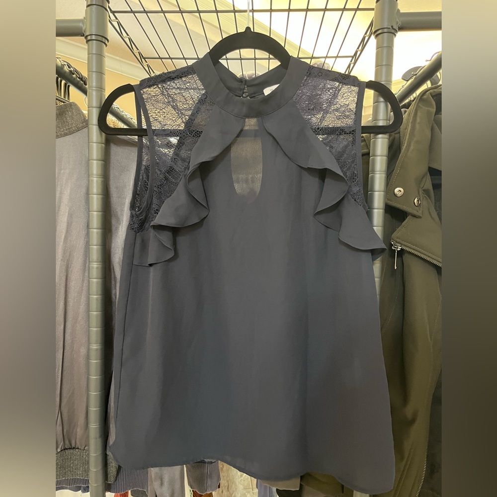 Dark blue sleeveless blouse